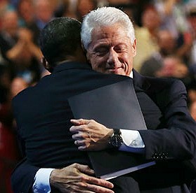 Pres. Obama and Bill Clinton hug
